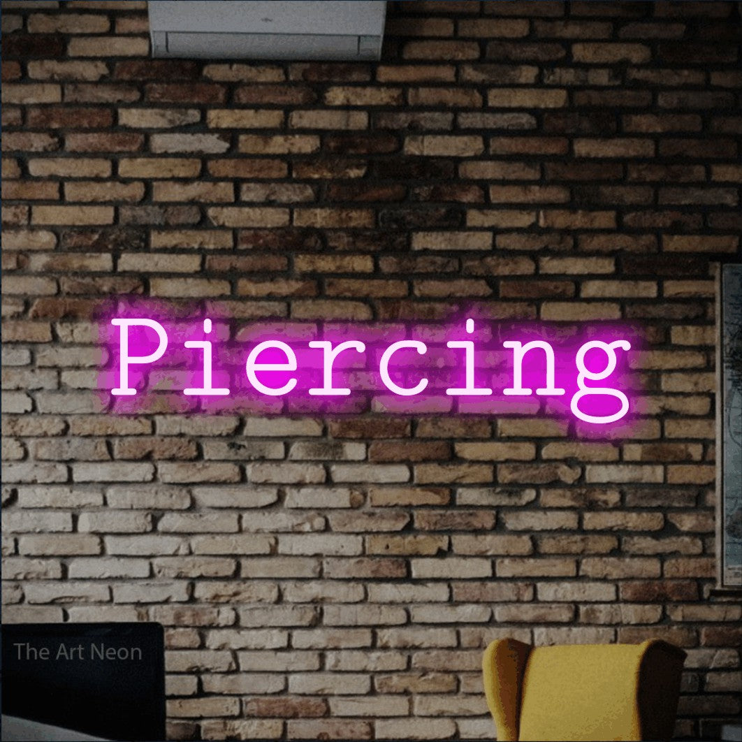 LED neon sign reading “Piercing”, arranged in a single line.