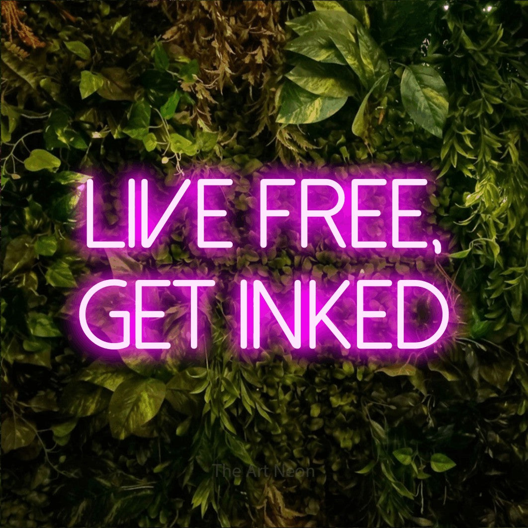 LED neon sign reading “Live Free, Get Inked”, arranged in two lines.