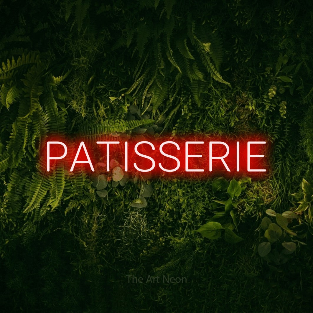 LED neon sign reading “PATISSERIE”, arranged in a single line.