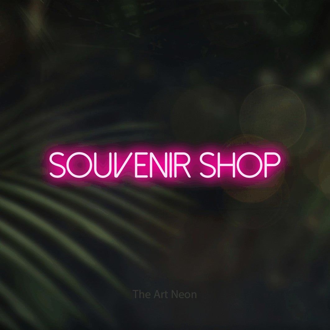 LED neon sign reading “Souvenir Shop”, arranged in a single line.