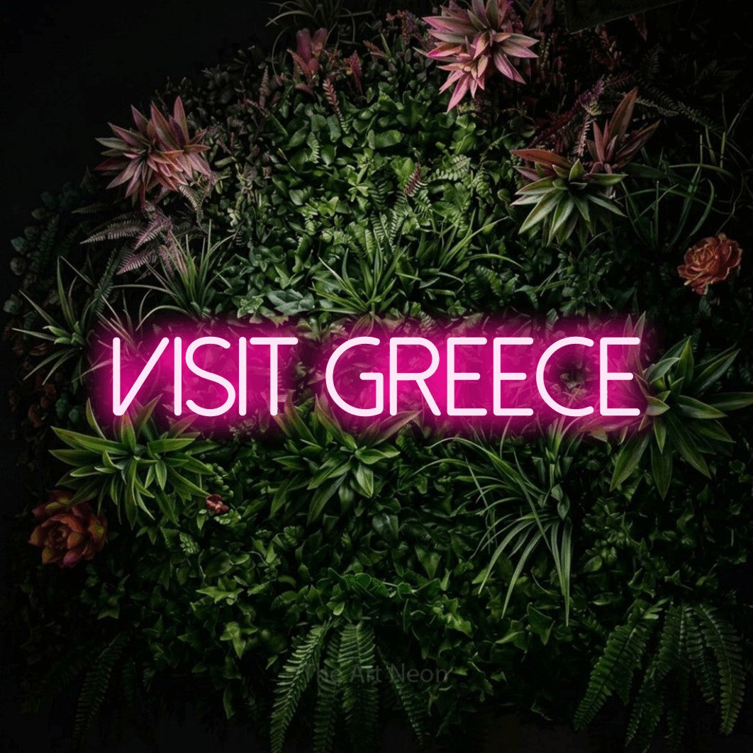 LED neon sign reading “VISIT GREECE”, arranged in a single line.