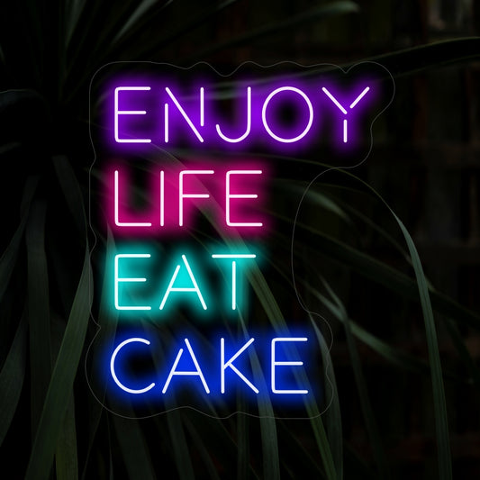 "Enjoy Life Eat Cake Neon Sign" lights up with a sweet glow, perfect for bakeries and spaces that celebrate life's joyous moments.