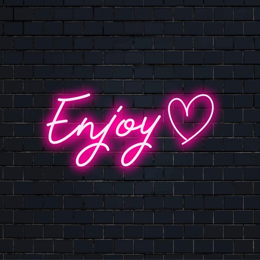 LED neon sign reading Enjoy, perfect personalized light decor for a trendy and inviting ambiance.