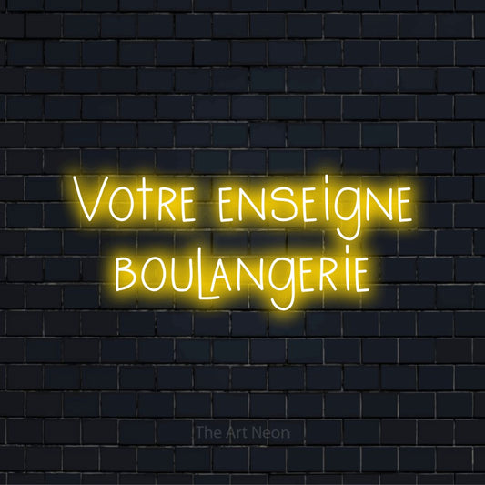 Enseigne néon personnalisée « Votre enseigne boulangerie » sur un mur en briques noires