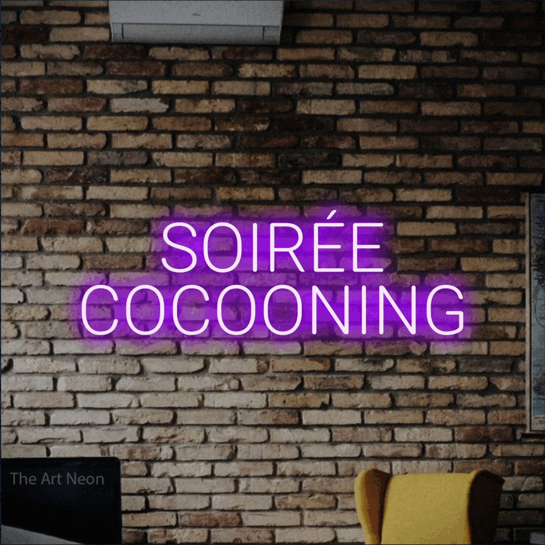 LED neon sign reading “SOIRÉE COCOONING”, arranged in 2 lines.