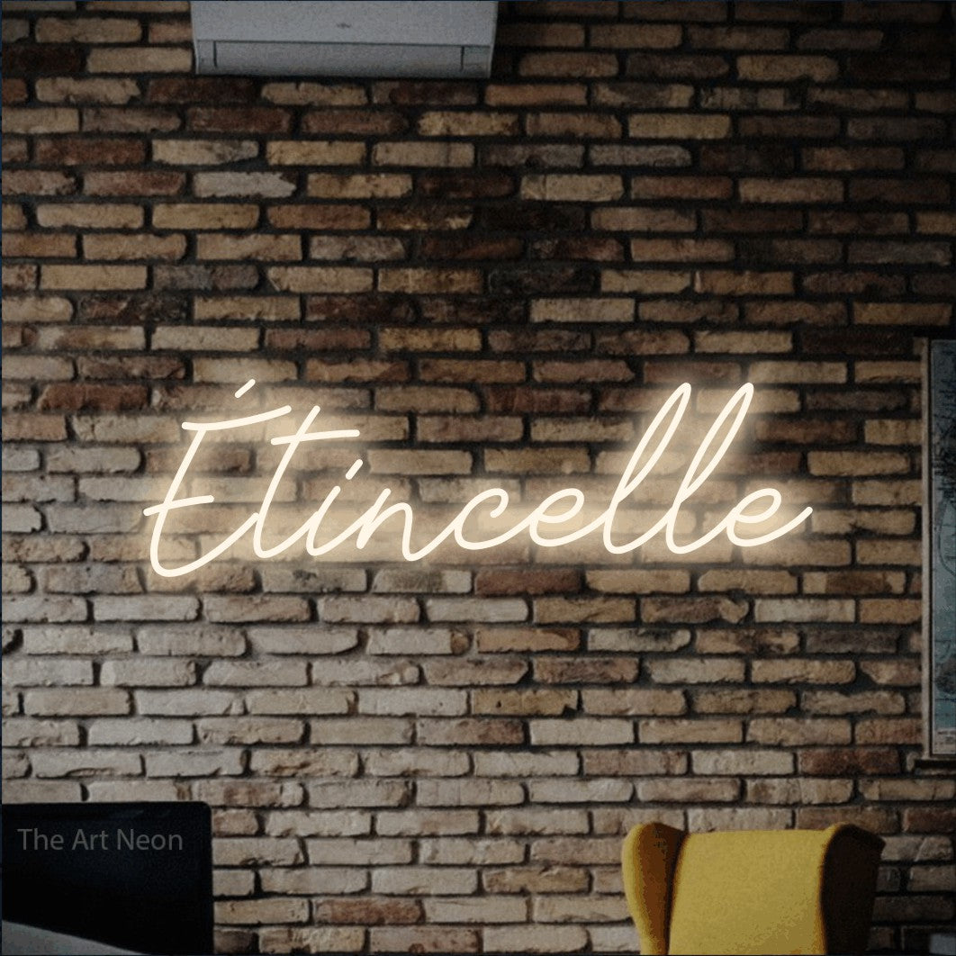 LED neon sign reading “Étincelle”, arranged in a single line.