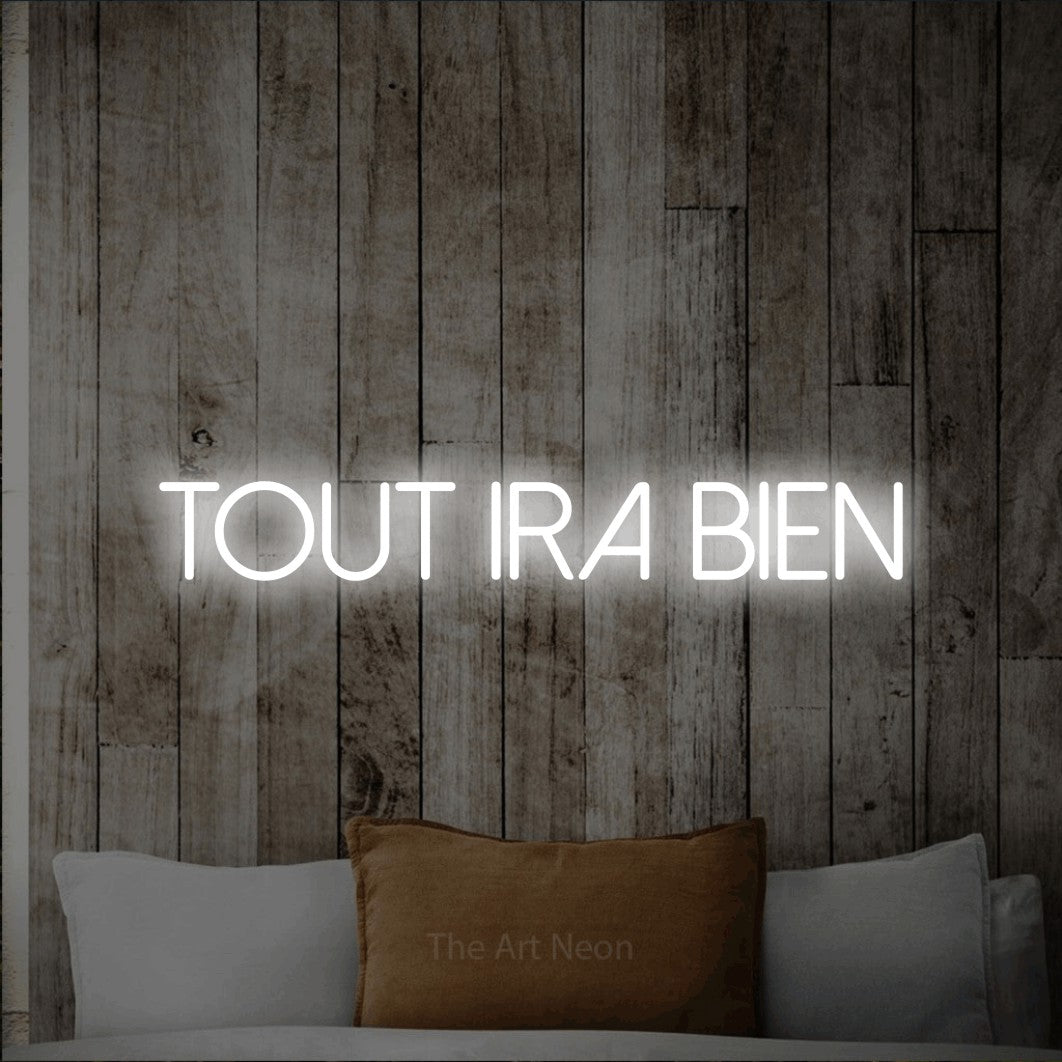 LED neon sign reading “Tout Ira Bien”, arranged in a single line.