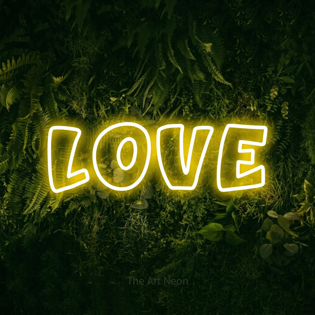 LED neon sign reading “LOVE”, arranged in a single line.