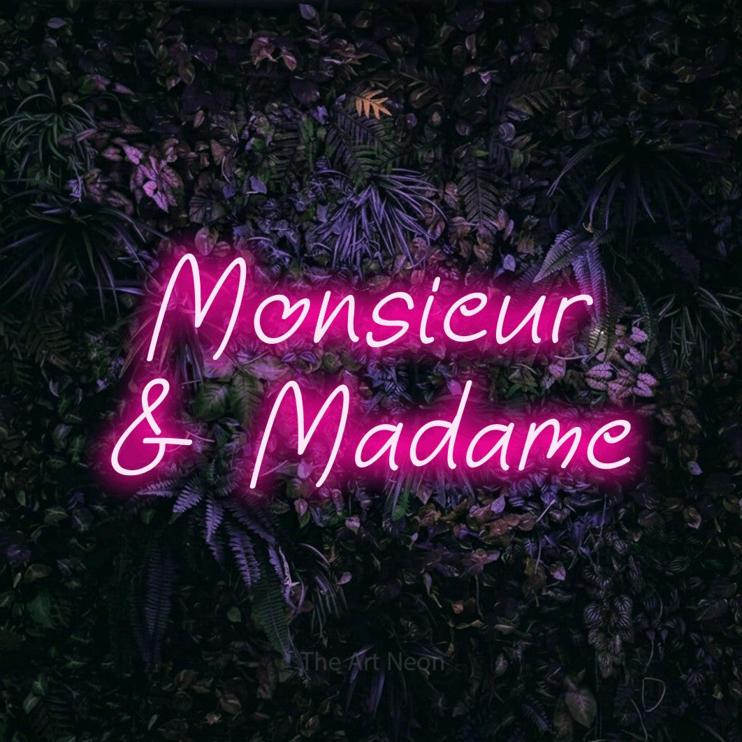 LED neon sign reading “Monsieur & Madame”, arranged in 2 lines.