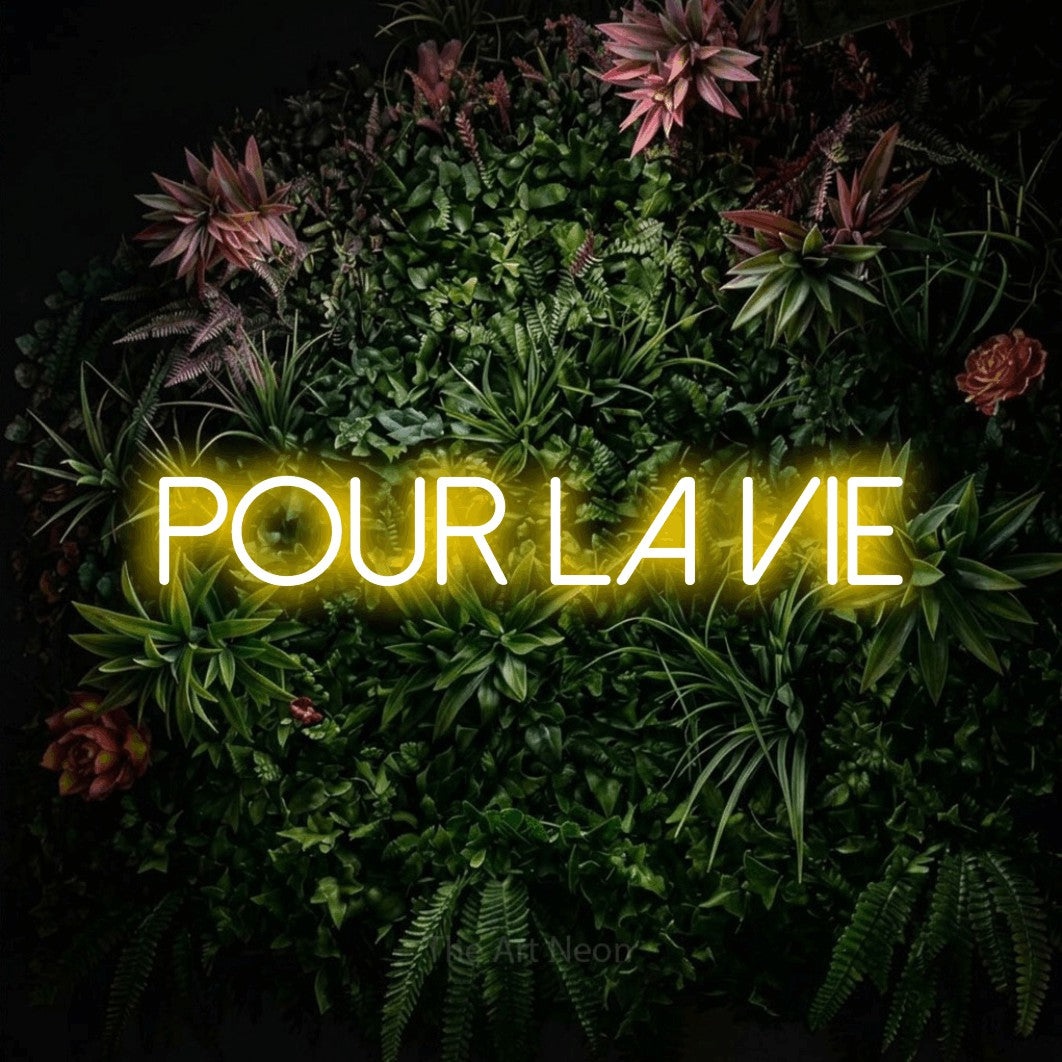 LED neon sign reading “POUR LA VIE”, arranged in a single line.