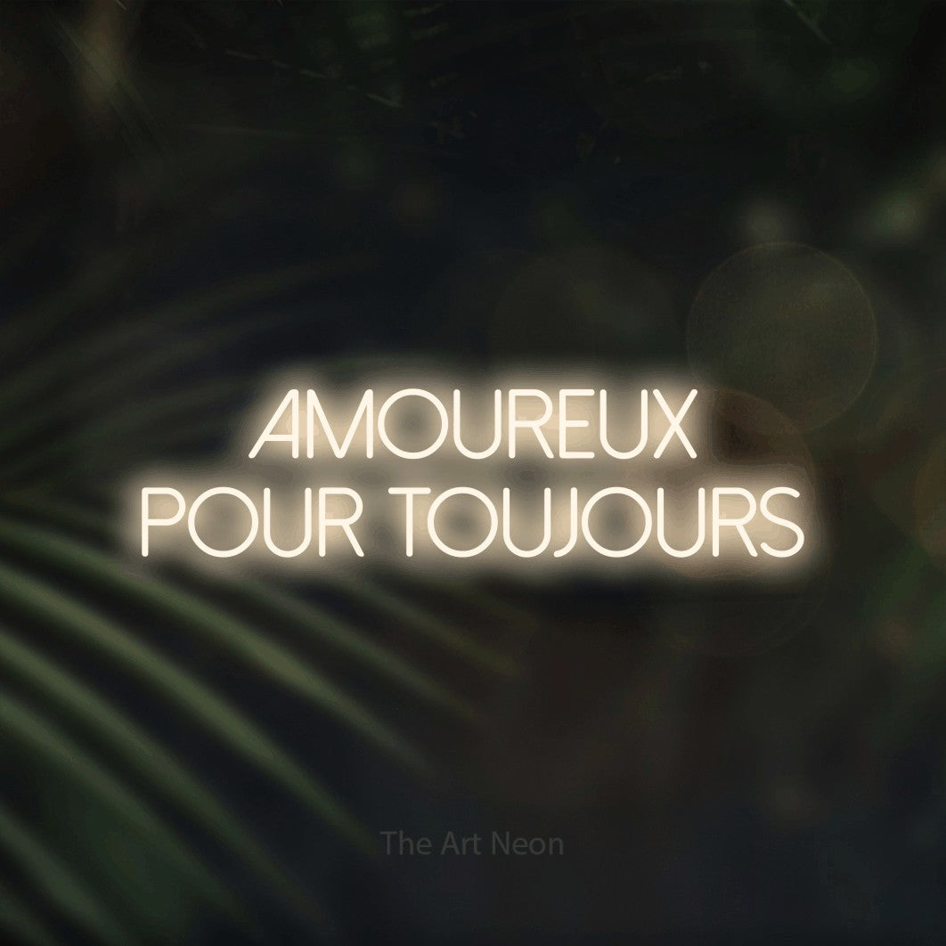 LED neon sign reading “Amoureux Pour Toujours”, arranged in 2 lines.