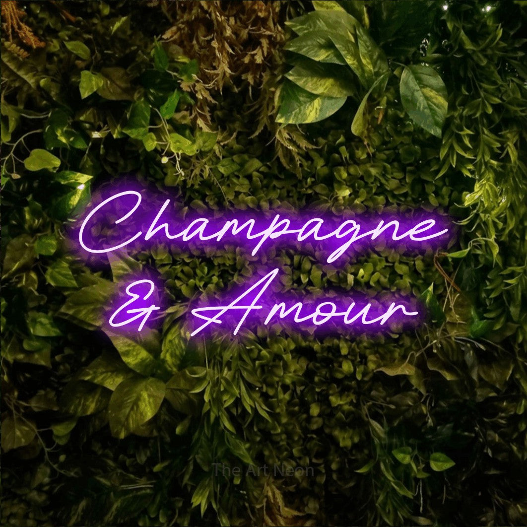 LED neon sign reading “Champagne & Amour”, arranged in 2 lines.
