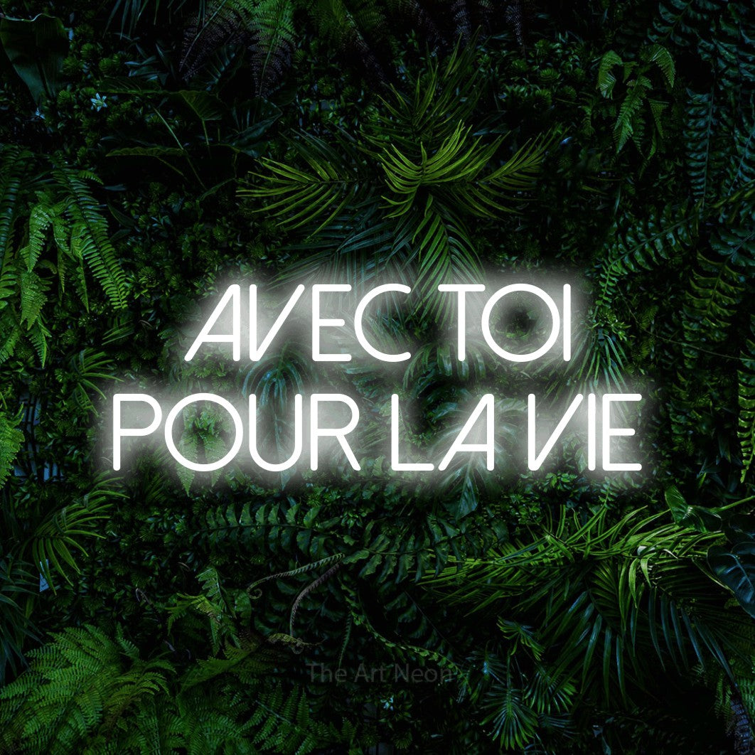 LED neon sign reading “AVEC TOI POUR LA VIE”, arranged in 2 lines.
