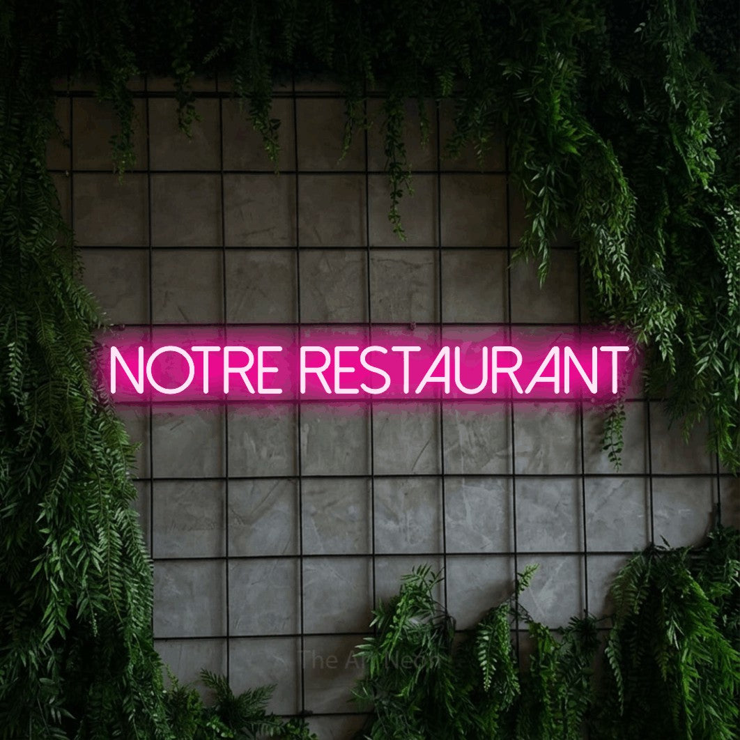 LED neon sign reading “Notre Restaurant”, arranged in a single line.