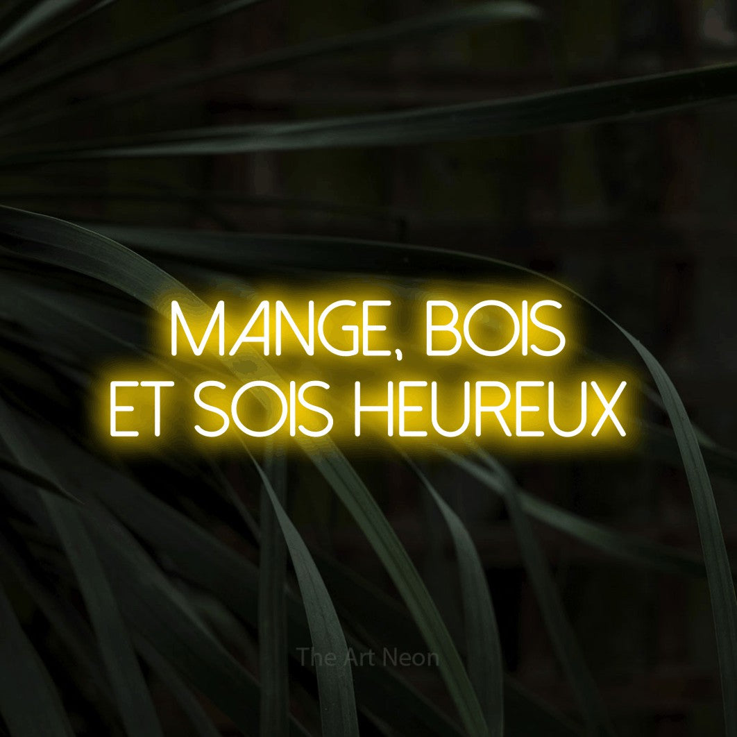 LED neon sign reading “mange, bois et sois heureux”, arranged in 2 lines.
