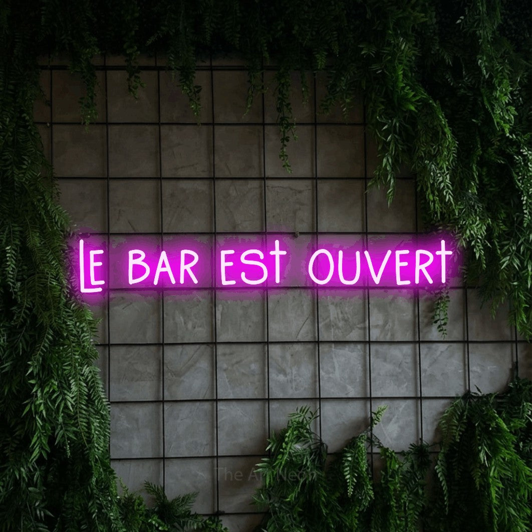 LED neon sign reading “le bar est ouvert”, arranged in a single line.