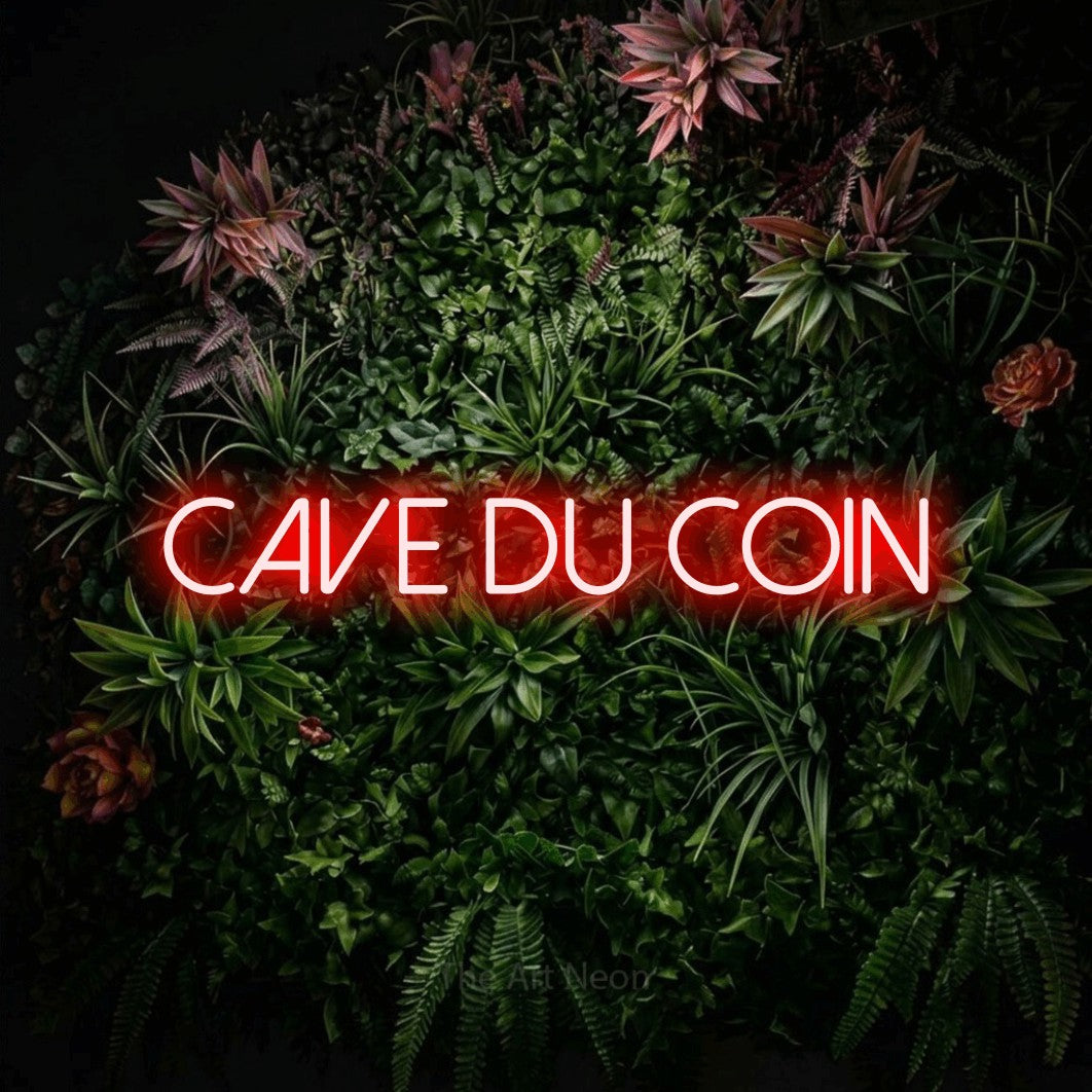 LED neon sign reading “cave du coin”, arranged in a single line.