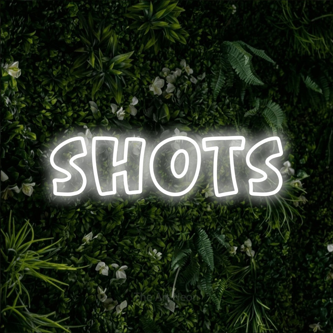 LED neon sign reading “SHOTS”, arranged in a single line.