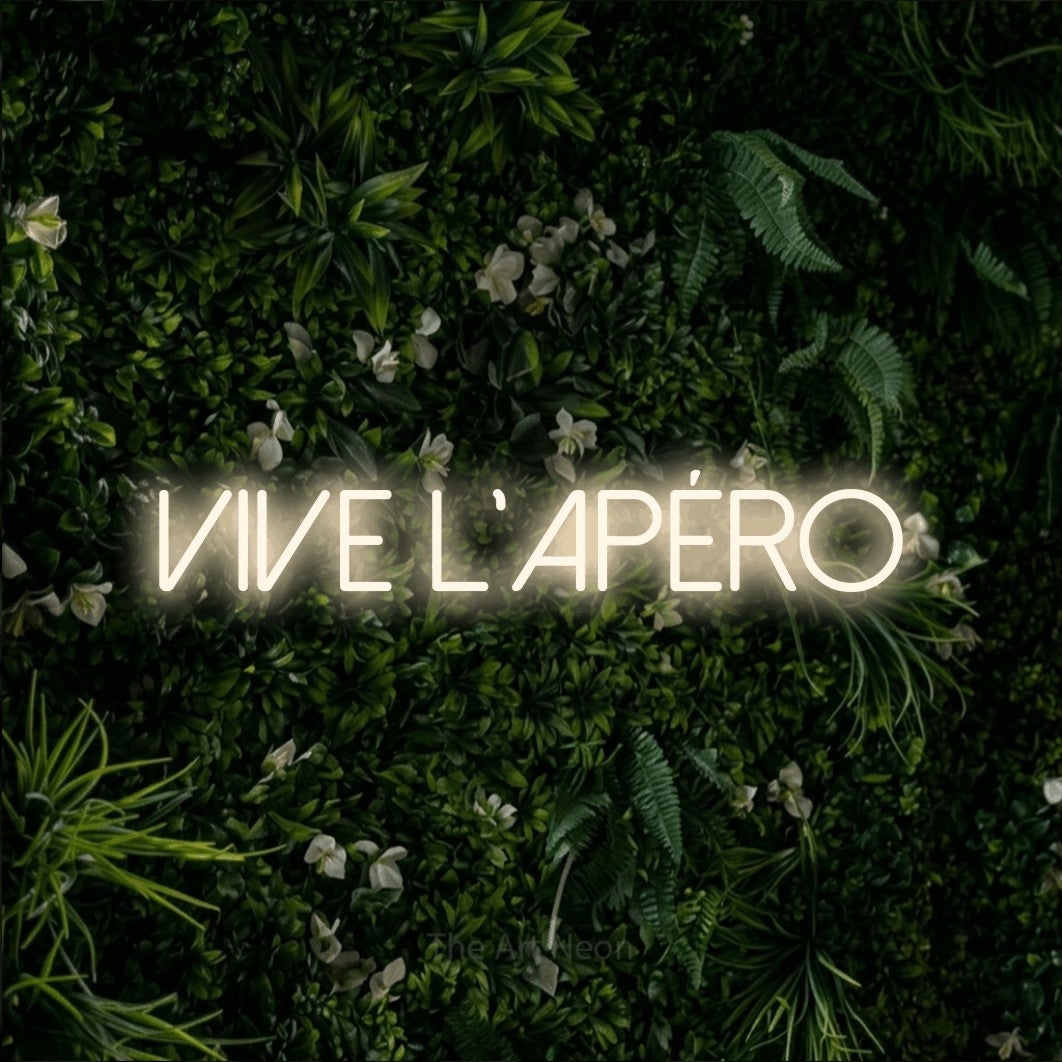 LED neon sign reading “VIVE L'APÉRO”, arranged in a single line.