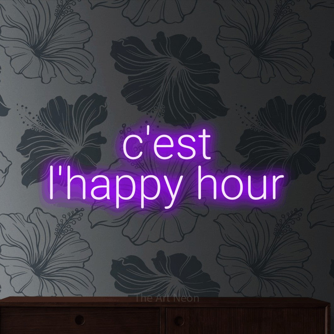 LED neon sign reading “c'est l'happy hour”, arranged in 2 lines.