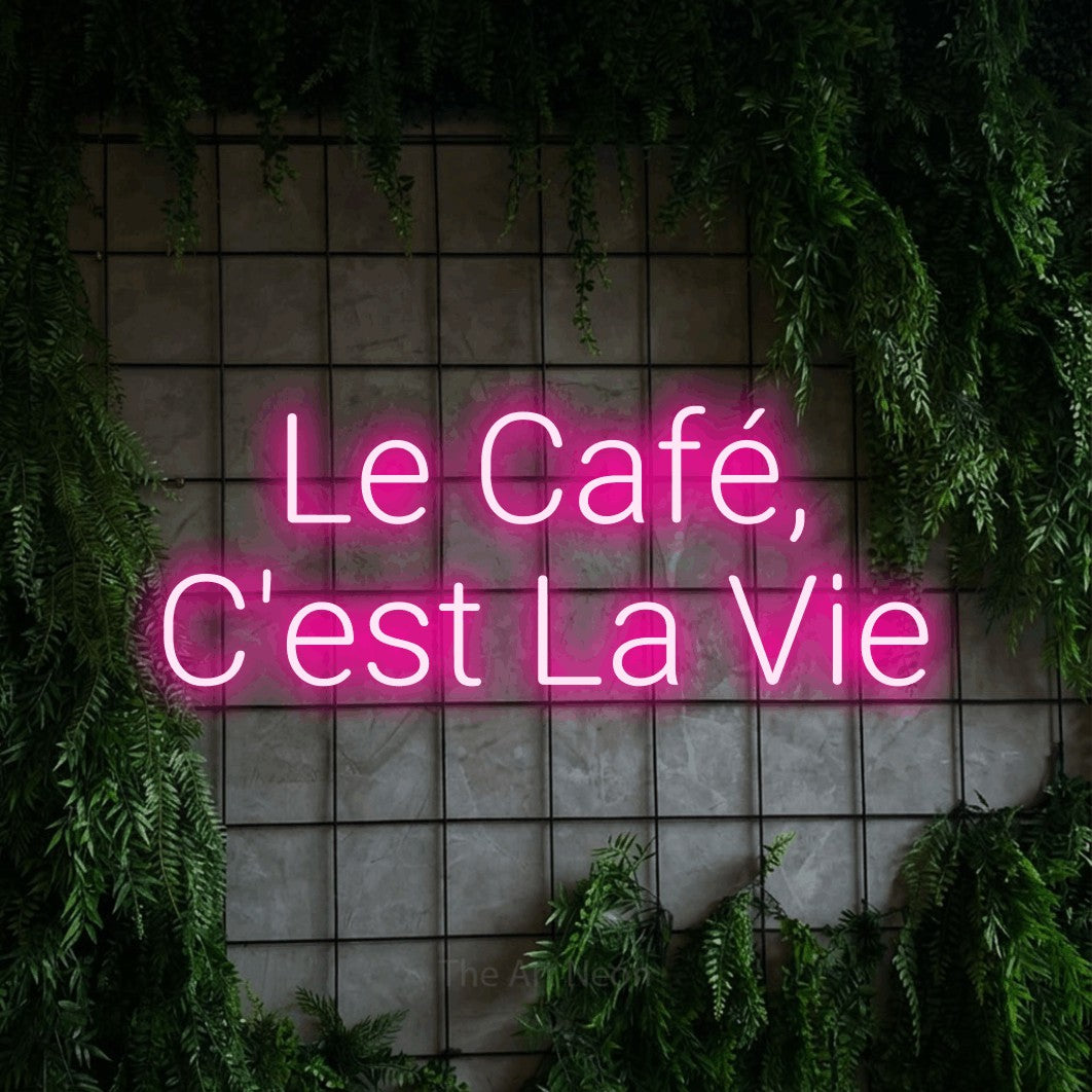 LED neon sign reading “Le Café, C'est La Vie”, arranged in 2 lines.
