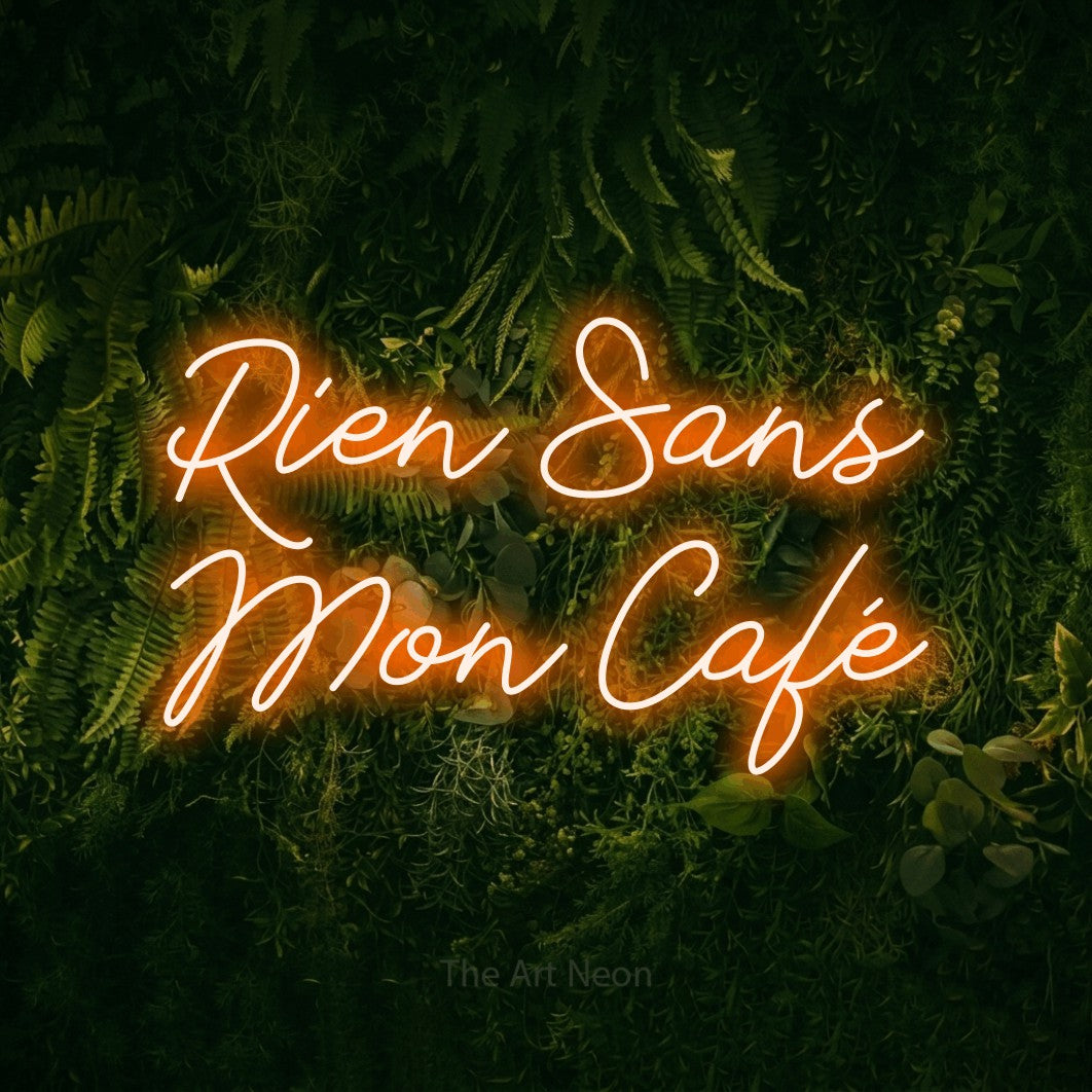 LED neon sign reading “Rien Sans Mon Café”, arranged in 2 lines.