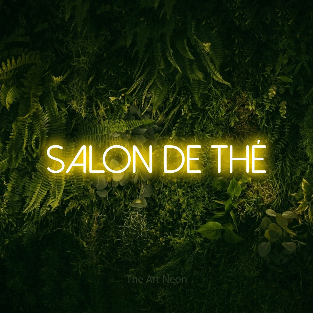 LED neon sign reading “SALON DE THÉ”, arranged in a single line.