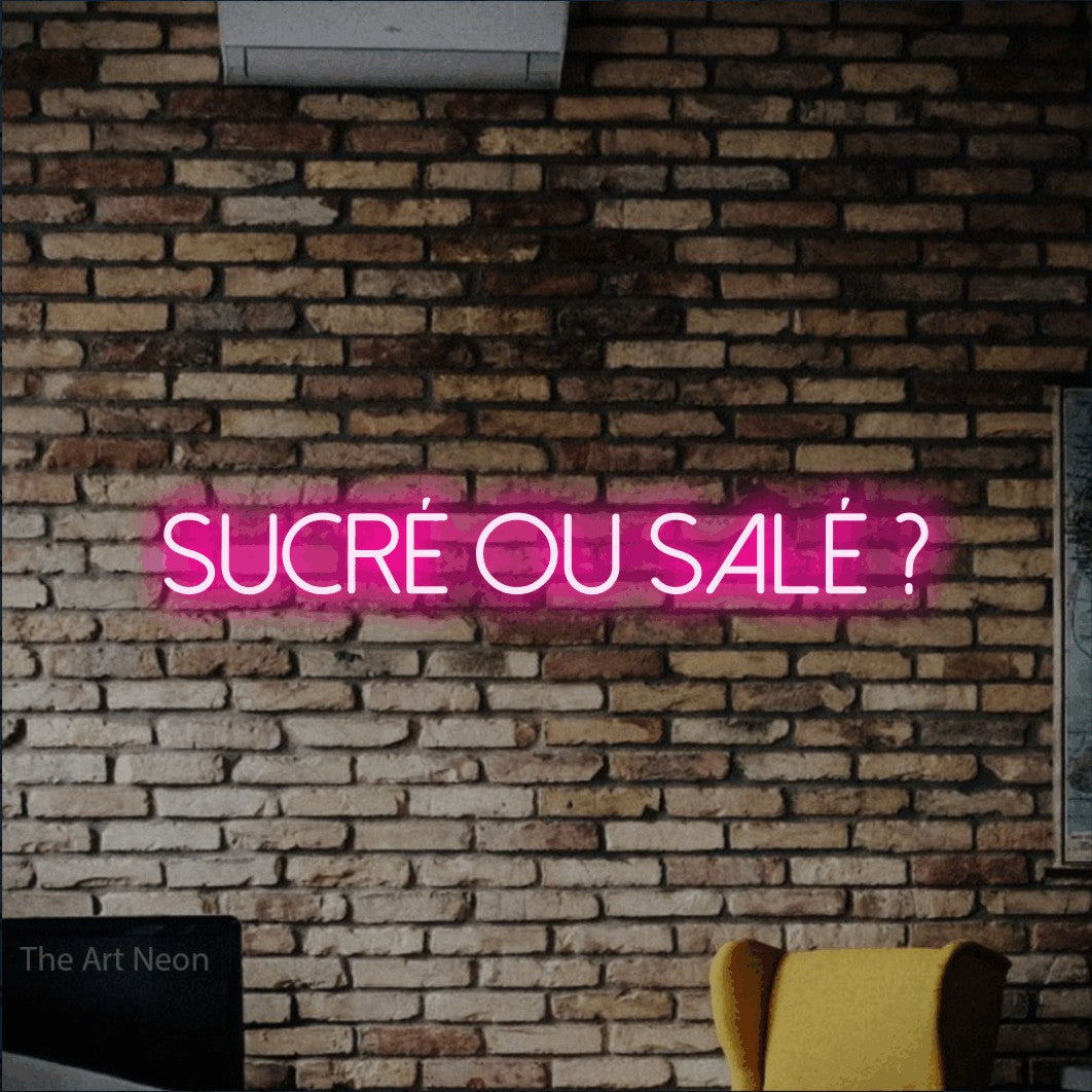 LED neon sign reading “sucré ou salé ?”, arranged in a single line.