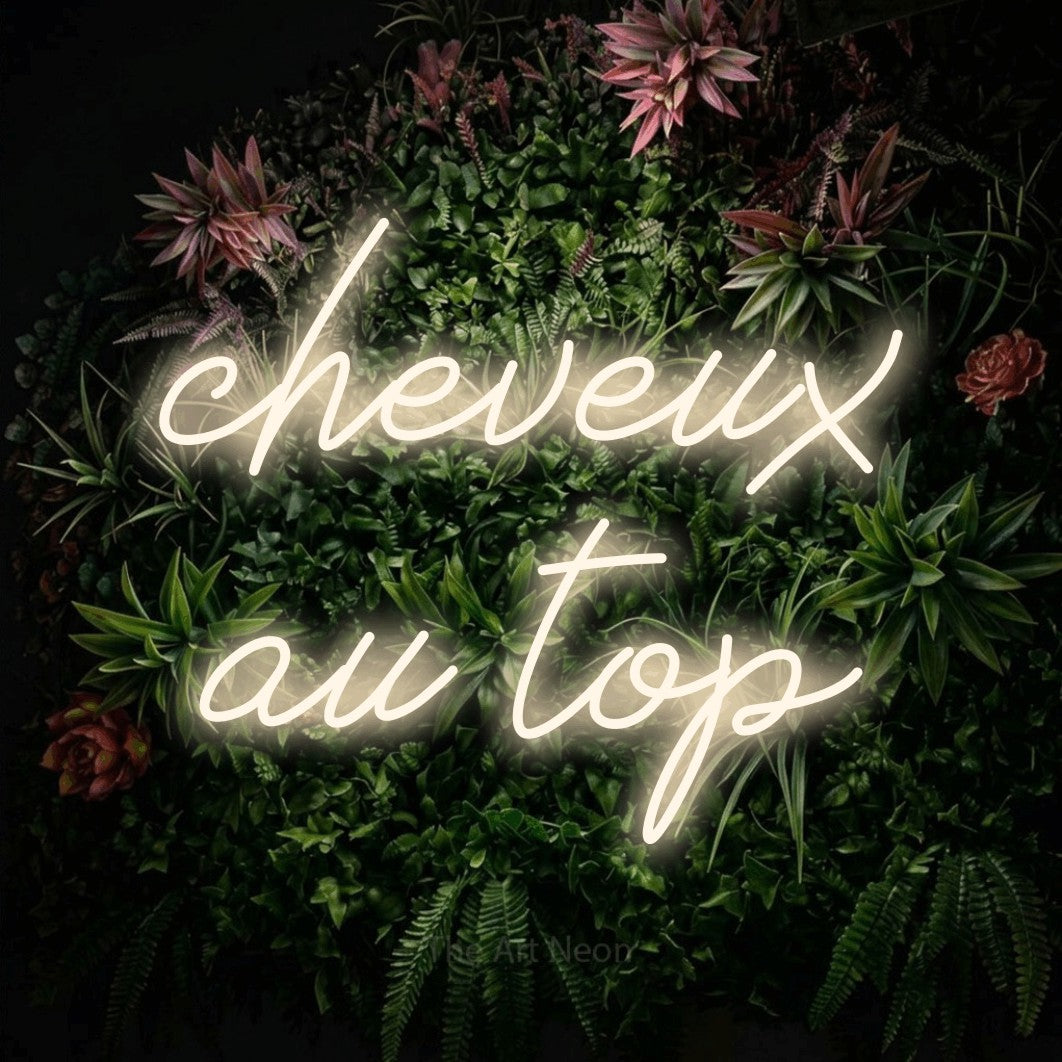 LED neon sign reading “cheveux au top”, arranged in 2 lines.