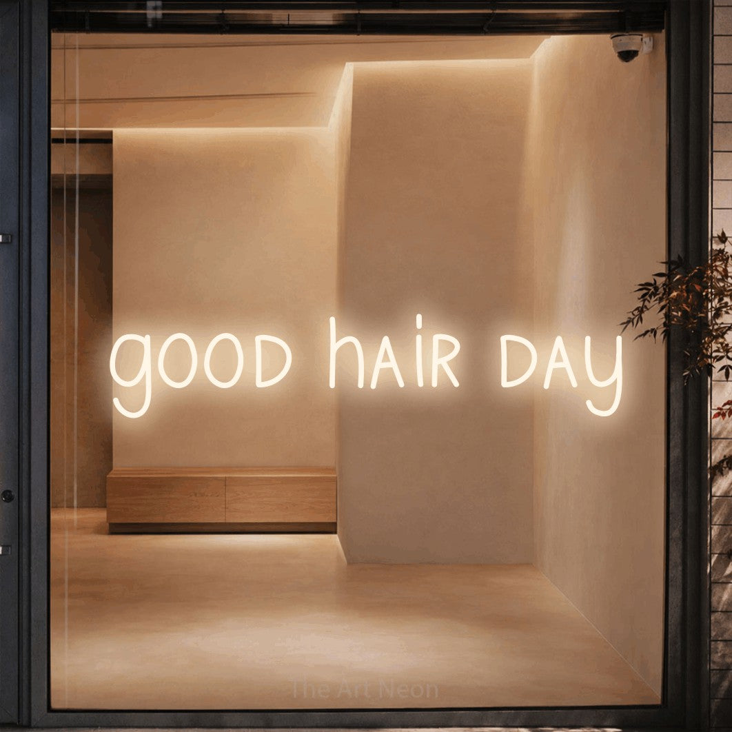 LED neon sign reading “good hair day”, arranged in a single line.