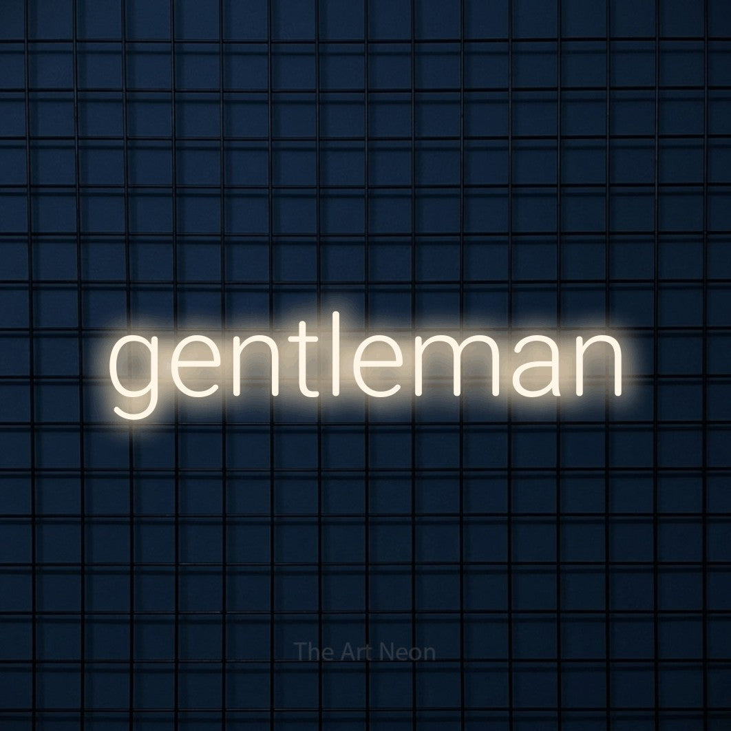 LED neon sign reading “gentleman”, arranged in a single line.