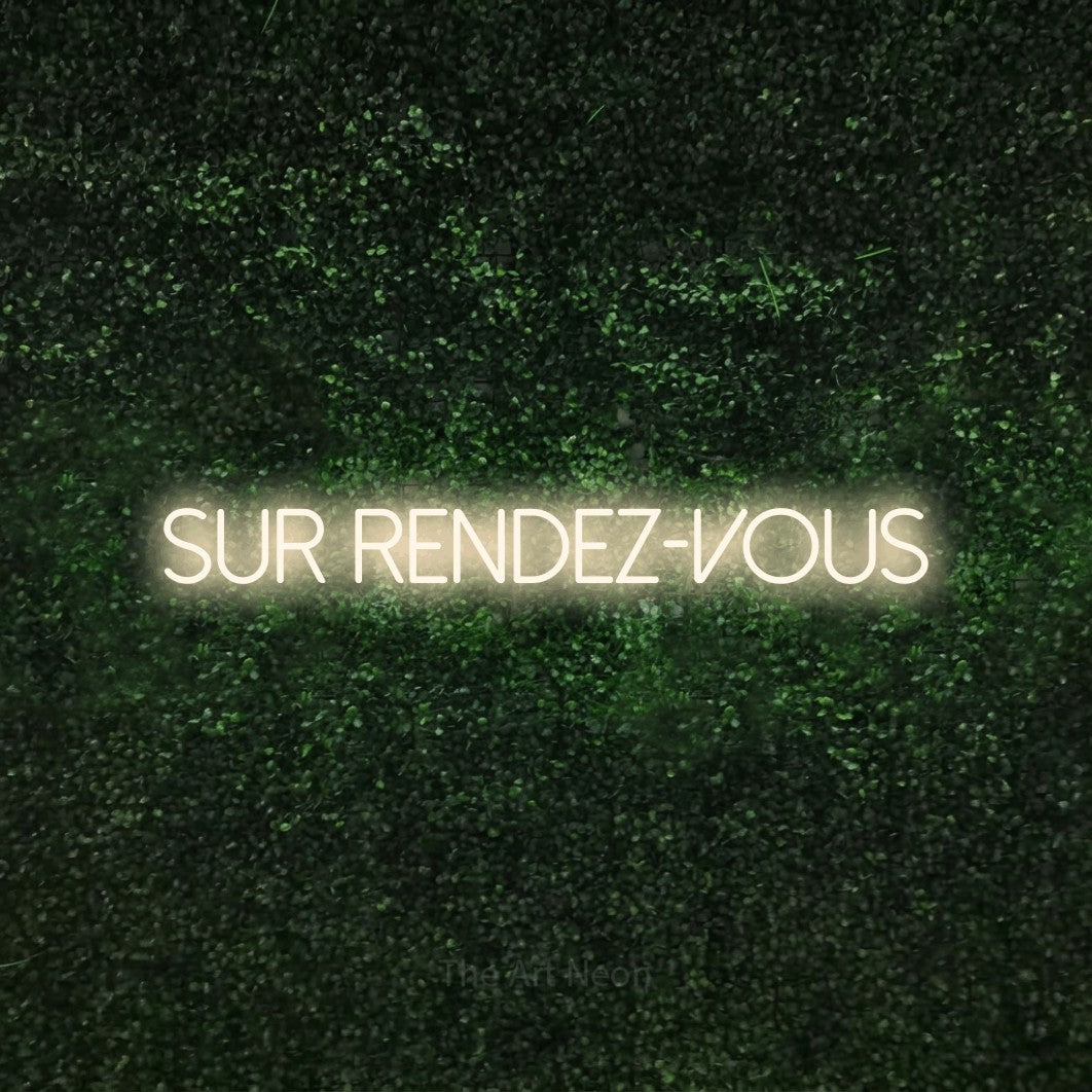 LED neon sign reading “sur rendez-vous”, arranged in a single line.