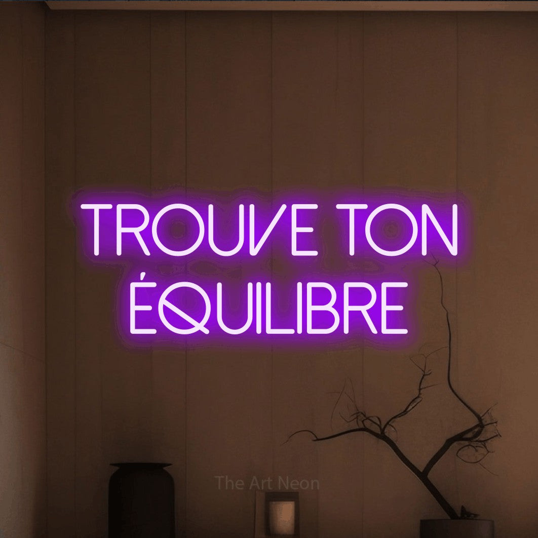 LED neon sign reading “Trouve Ton Équilibre”, arranged in 2 lines.