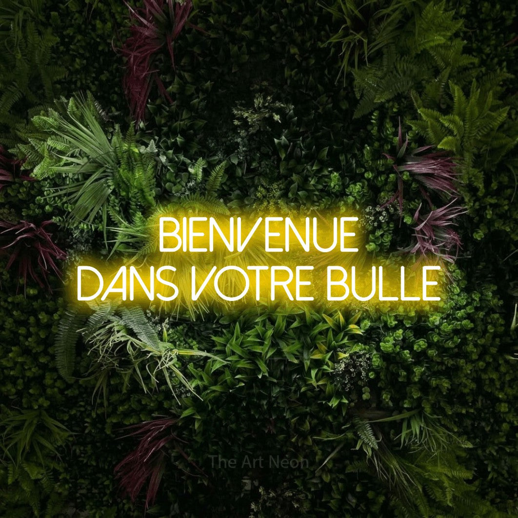 LED neon sign reading “BIENVENUE DANS VOTRE BULLE”, arranged in 2 lines.