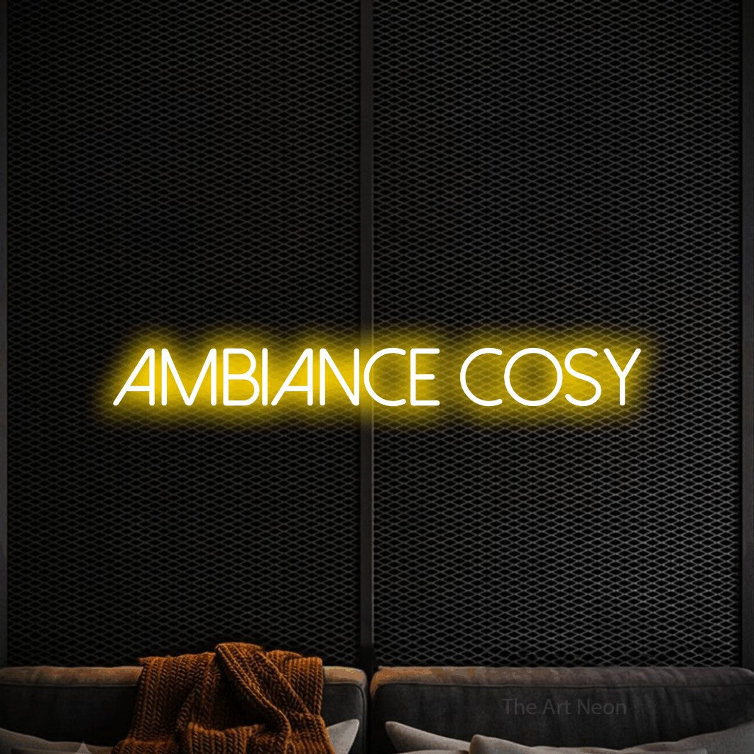 LED neon sign reading “Ambiance Cosy”, arranged in a single line.