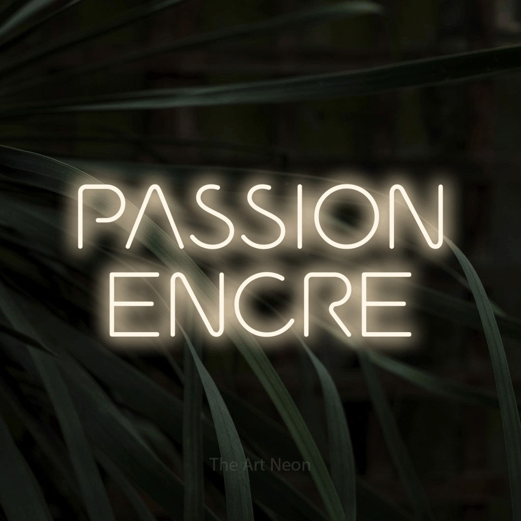 LED neon sign reading “PASSION ENCRE”, arranged in 2 lines.