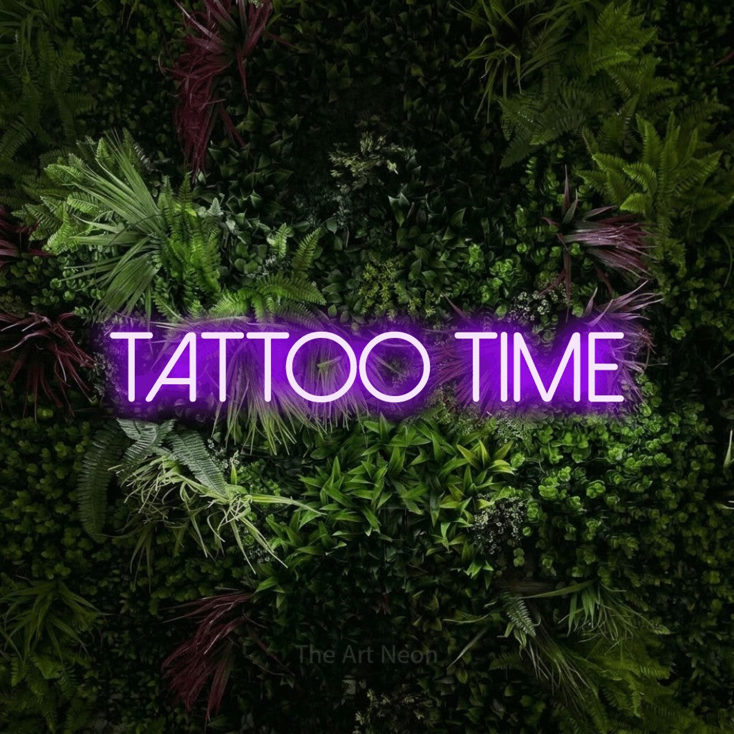 LED neon sign reading “TATTOO TIME”, arranged in a single line.