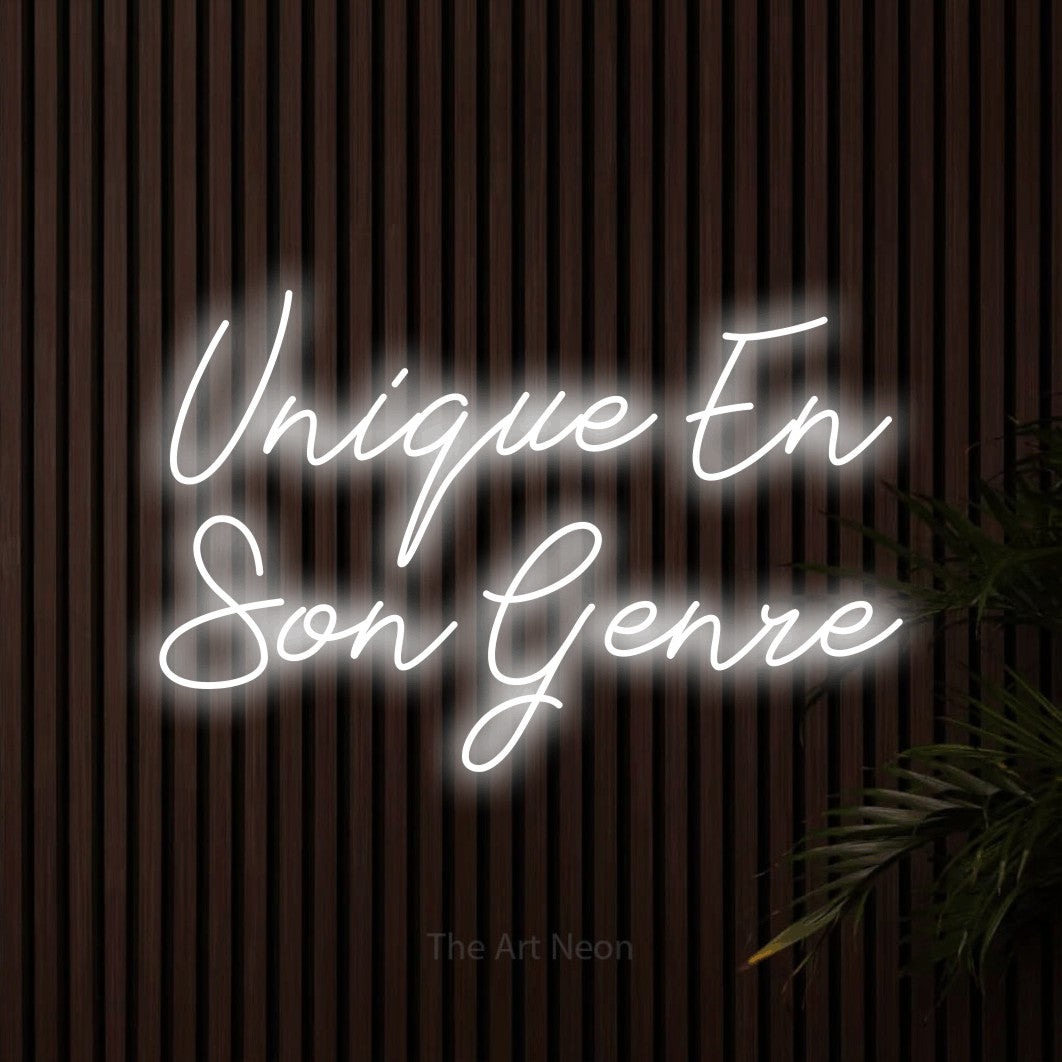 LED neon sign reading “Unique En Son Genre”, arranged in 2 lines.