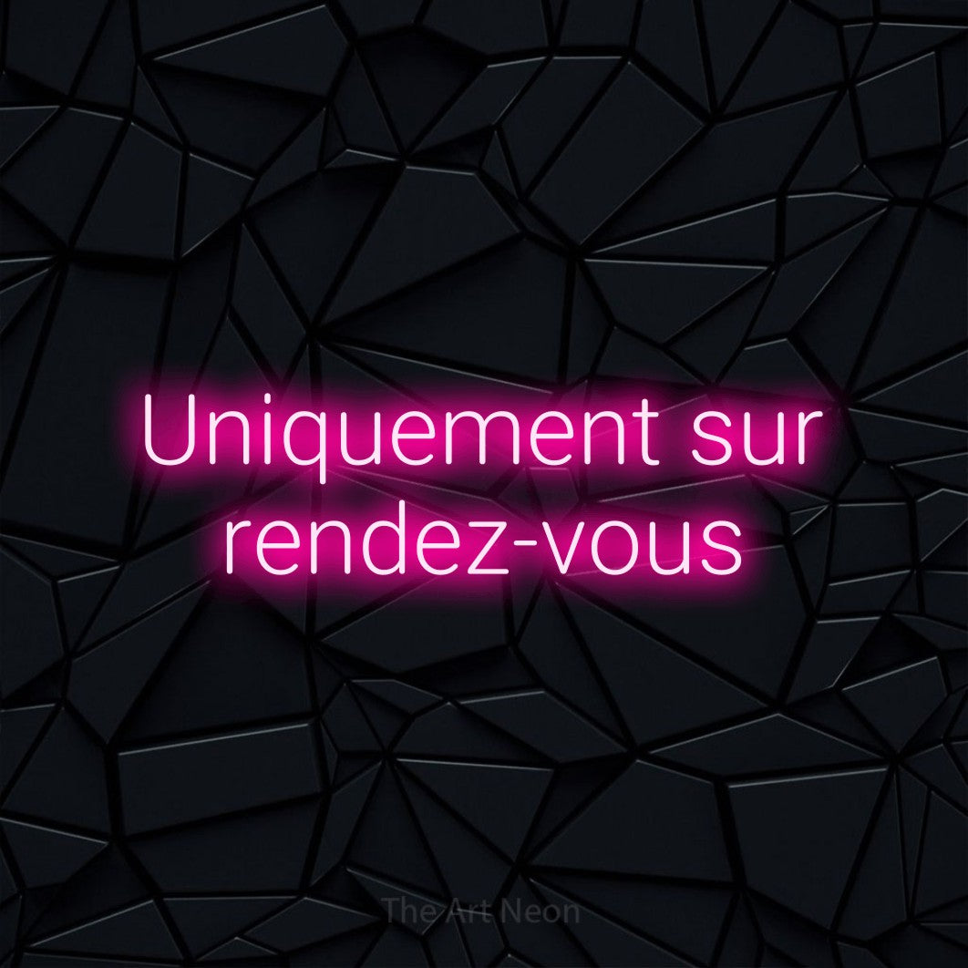 LED neon sign reading “Uniquement sur rendez-vous”, arranged in 2 lines.