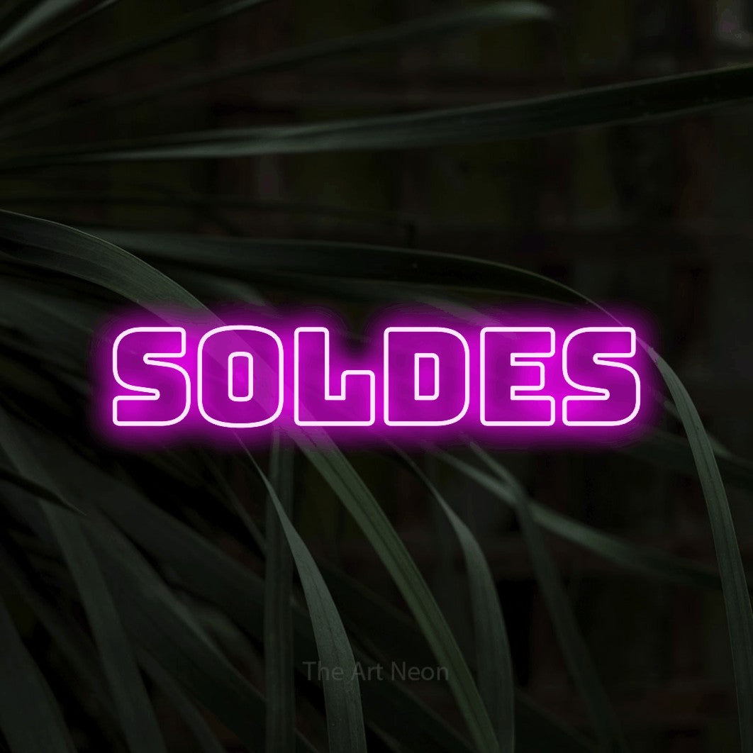 LED neon sign reading “soldes”, arranged in a single line.