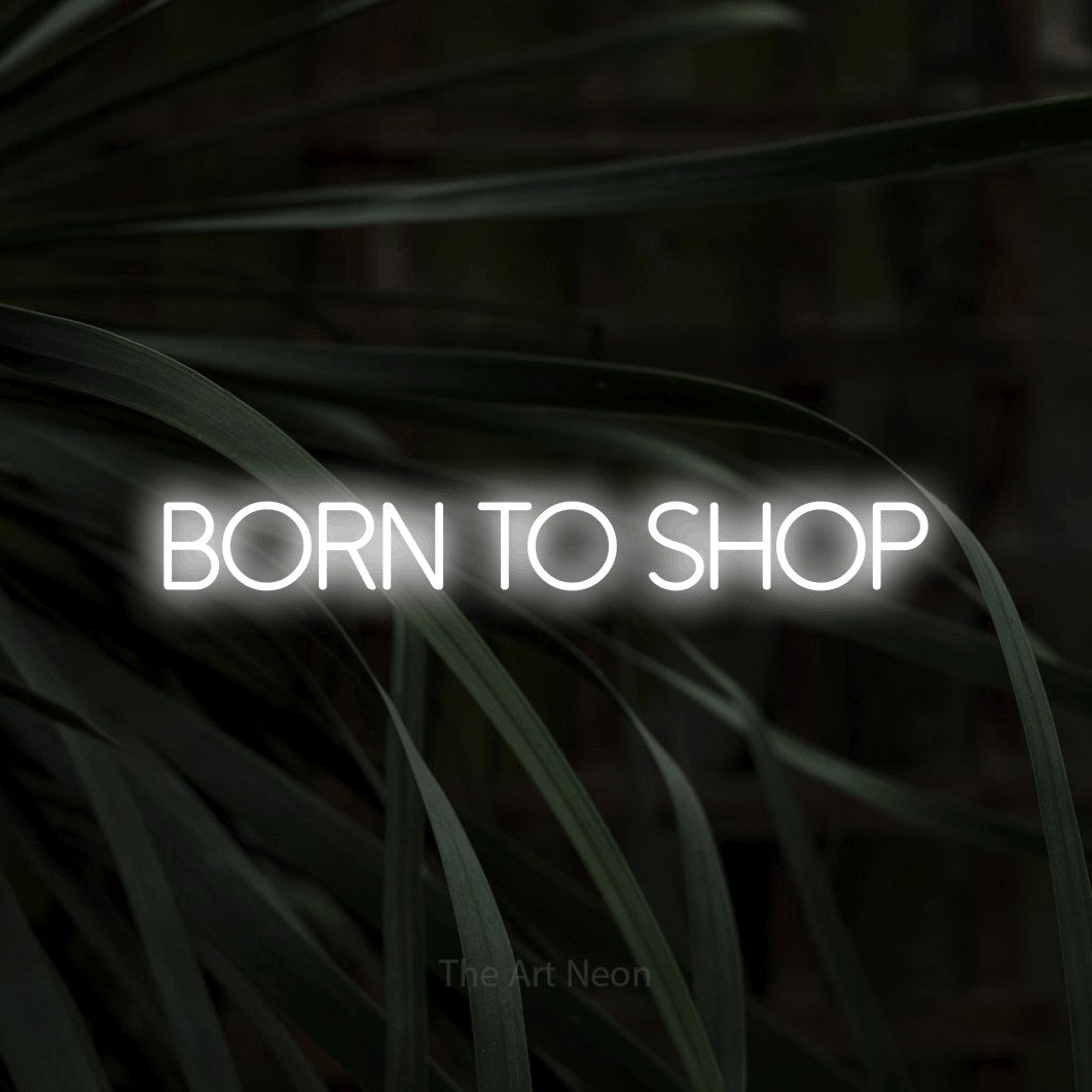LED neon sign reading “BORN TO SHOP”, arranged in a single line.
