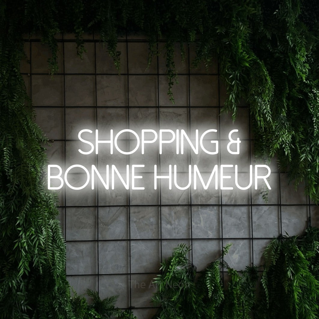 LED neon sign reading “Shopping & Bonne Humeur”, arranged in 2 lines.