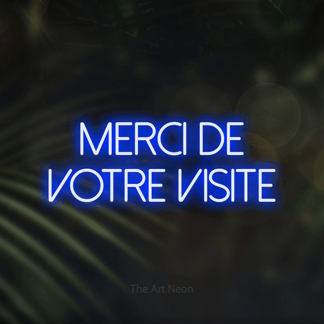 LED neon sign reading “MERCI DE VOTRE VISITE”, arranged in 2 lines.
