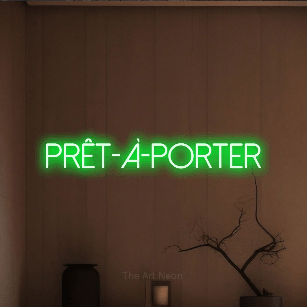 LED neon sign reading “Prêt-à-porter”, arranged in a single line.
