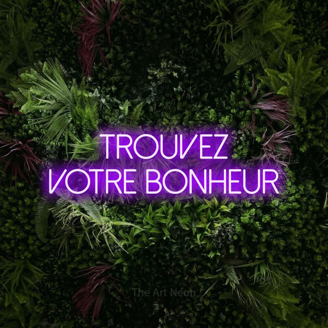 LED neon sign reading “trouvez votre bonheur”, arranged in 2 lines.