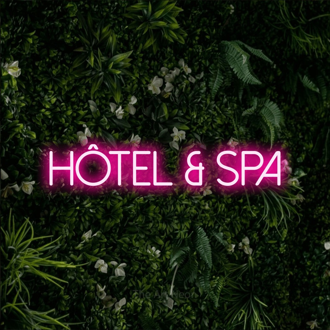 LED neon sign reading “HÔTEL & SPA”, arranged in a single line.