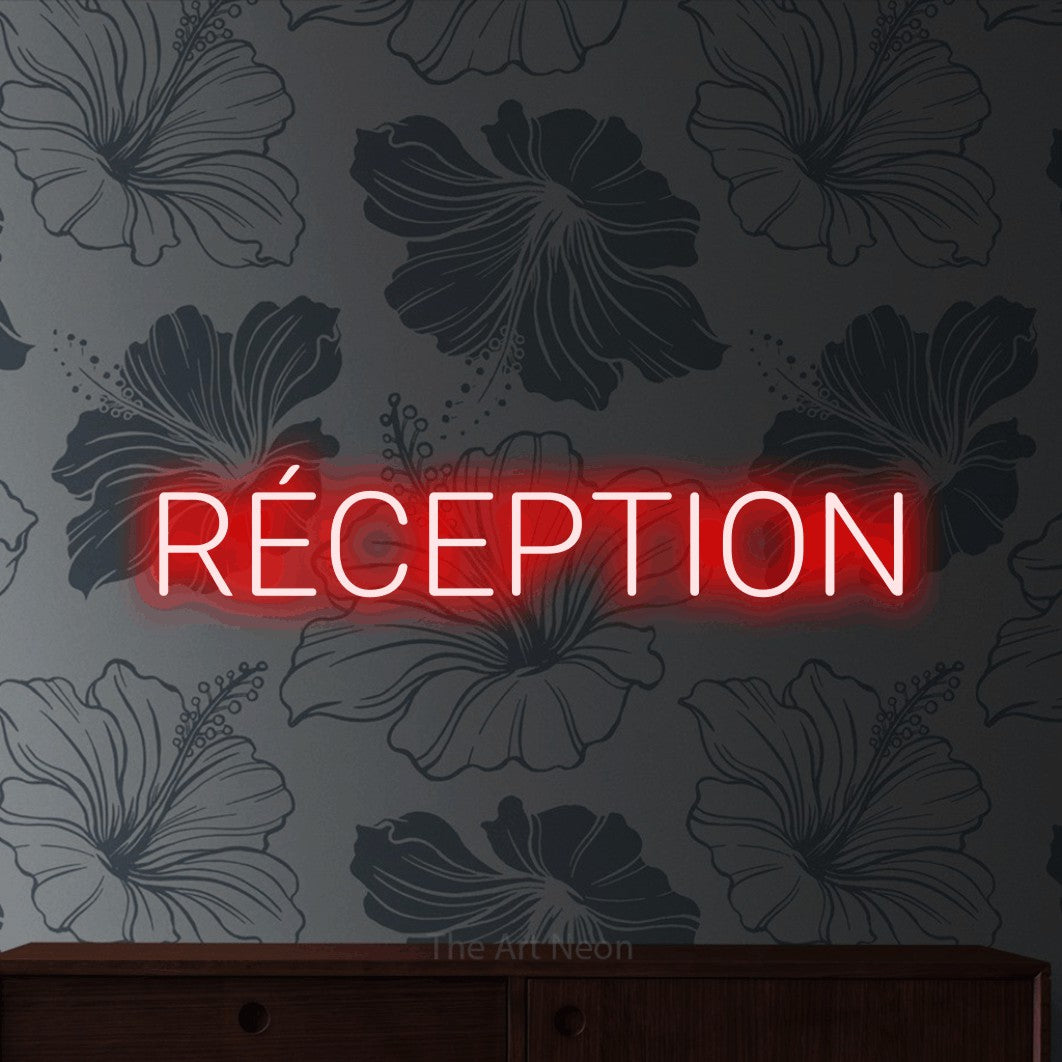 LED neon sign reading “RÉCEPTION”, arranged in a single line.