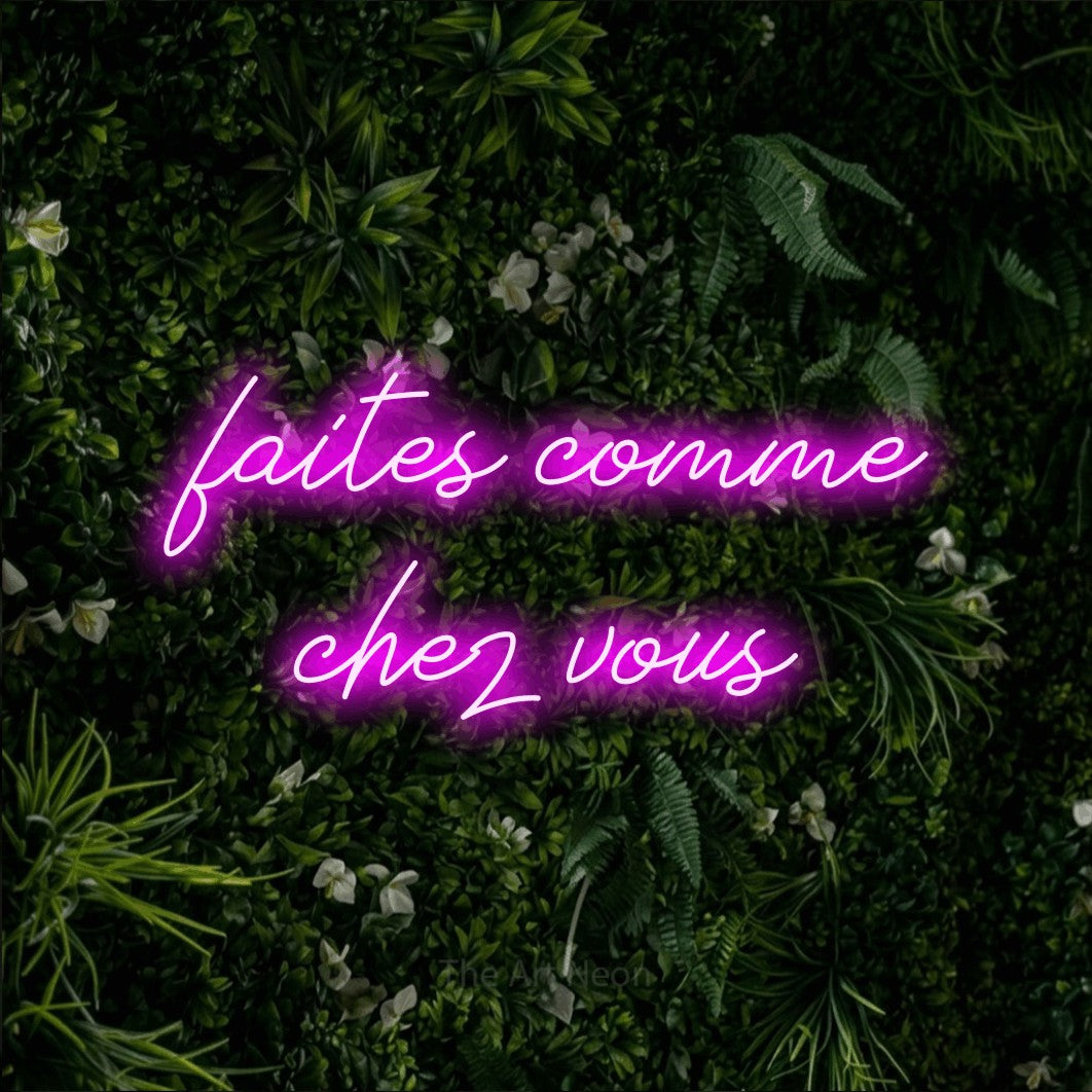 LED neon sign reading “faites comme chez vous”, arranged in 2 lines.