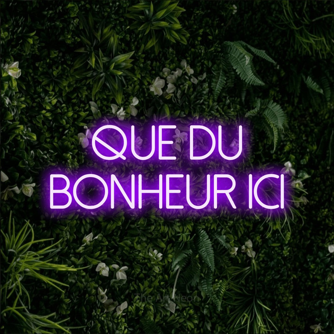LED neon sign reading “QUE DU BONHEUR ICI”, arranged in 2 lines.