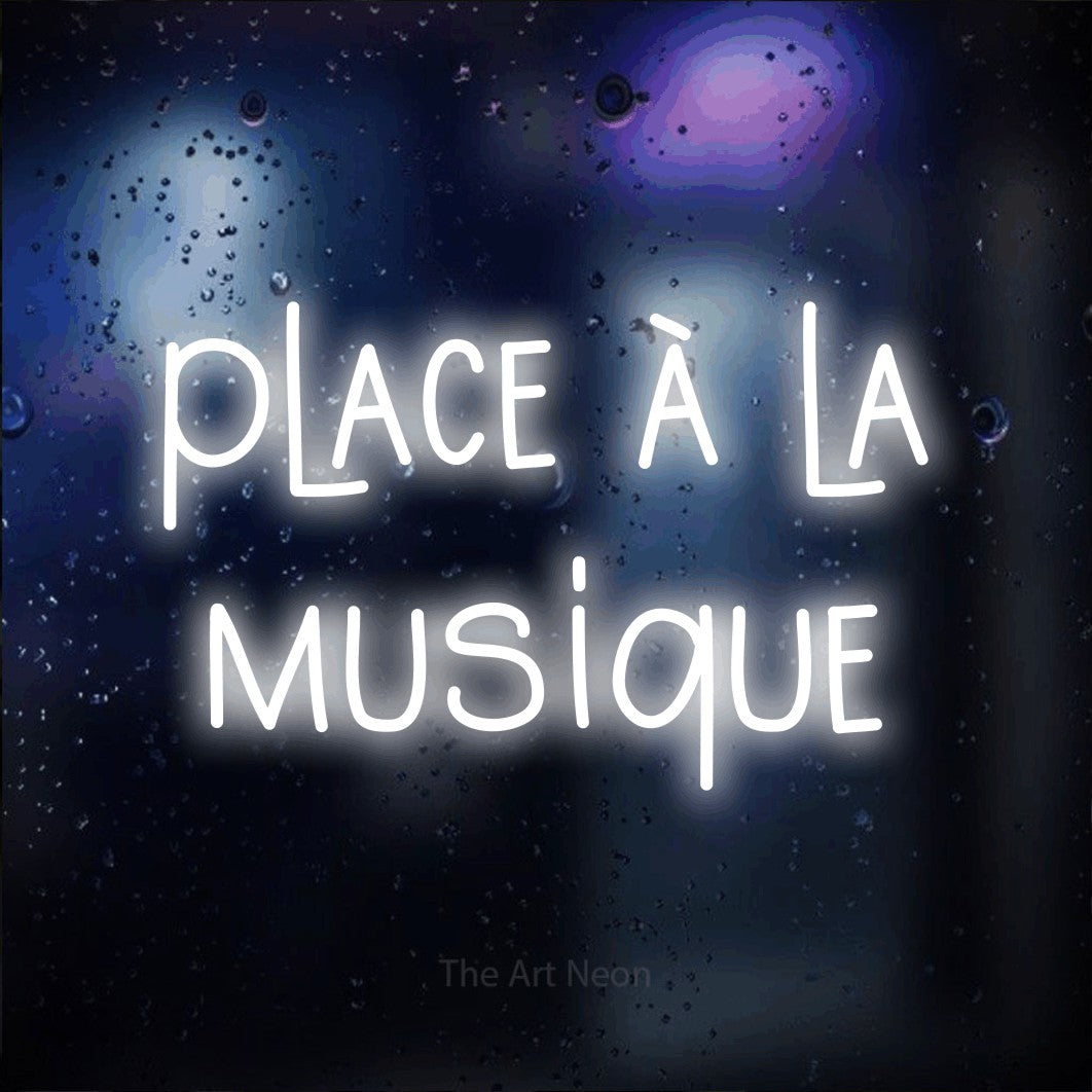 LED neon sign reading “place à la musique”, arranged in 2 lines.
